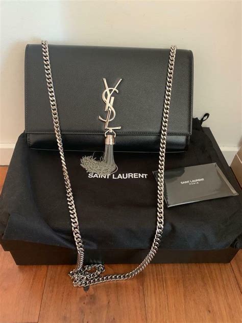 used ysl tassel bag|ysl handbags with tassel.